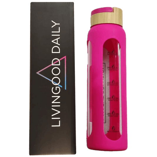 Livingood Daily branded pink water bottle next to packaging box